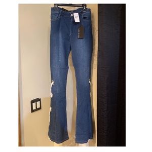 NWT BLUE JEAN FLARE JEANS WITH CUT OUTS sz 7